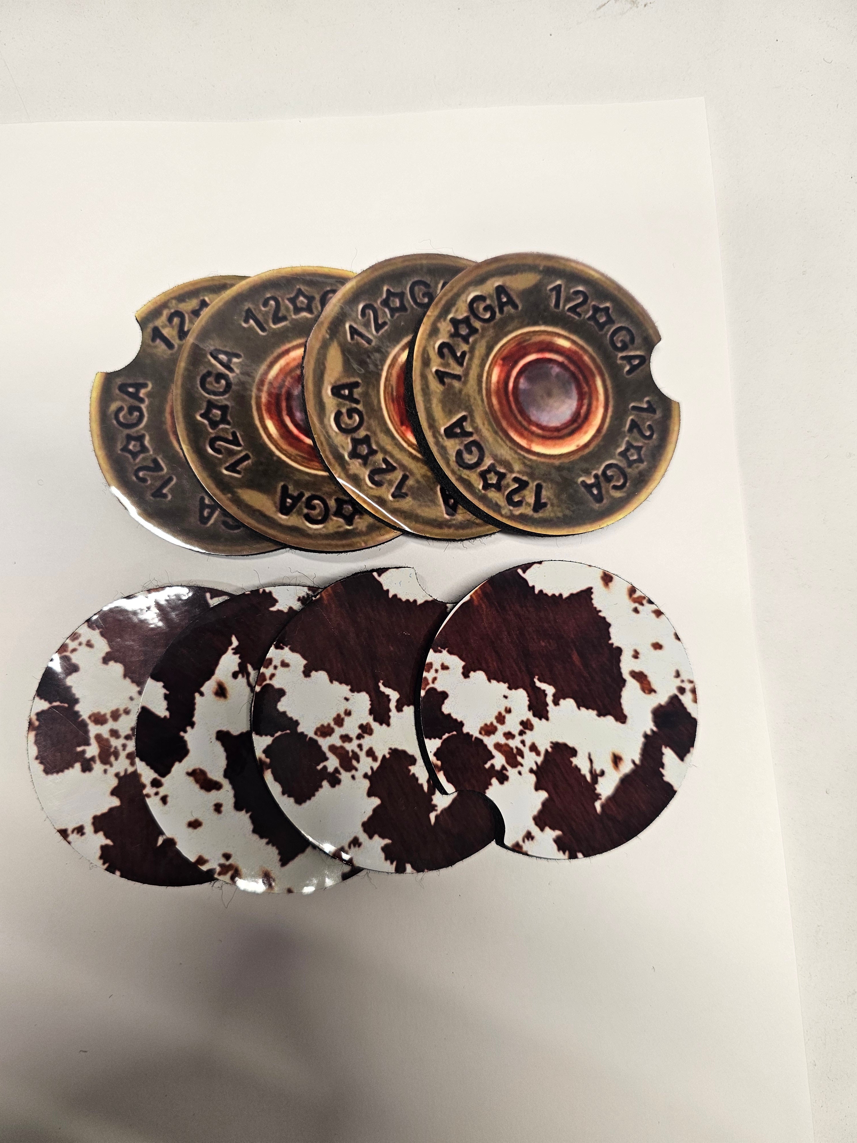 Bullet and cow hide neoprene car coasters set